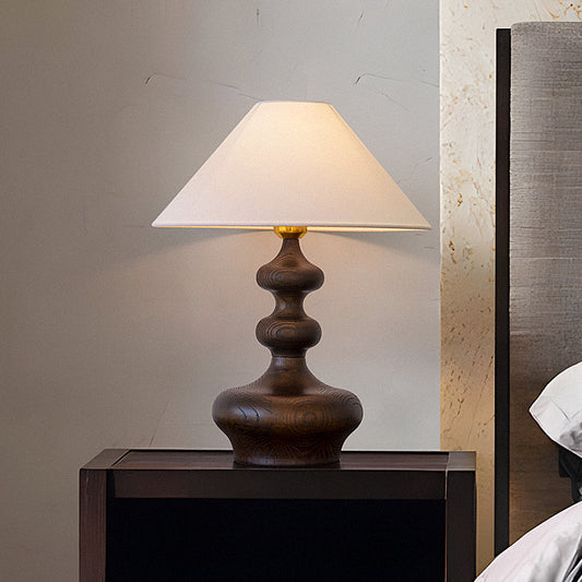 Sculpted wooden table lamp