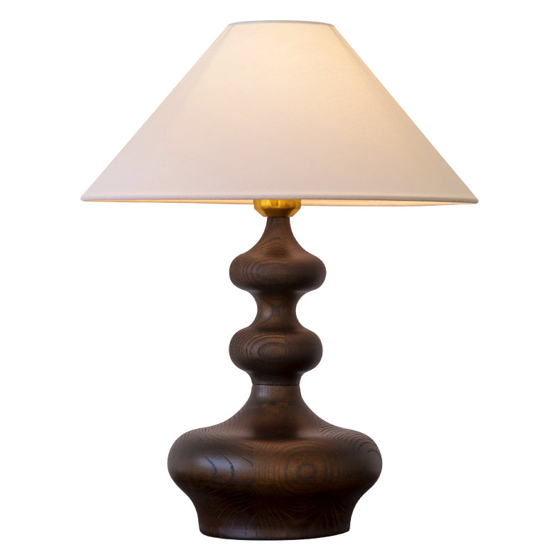 Sculpted wooden table lamp  white background image