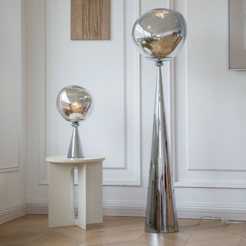 Sleek glass globe floor and table lamps