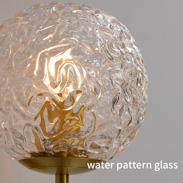 Gold and glass ball wall lamp details