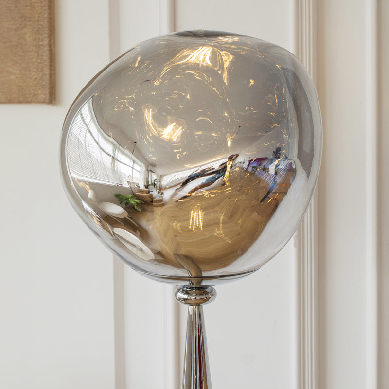 Glossy mirrored sphere