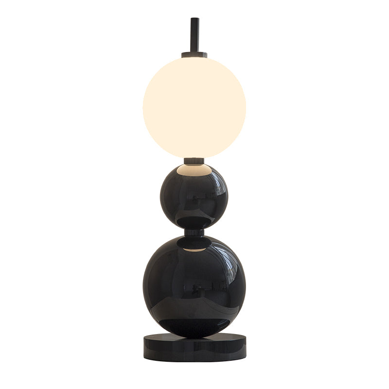 Black spherical modern desk lamp  white background image